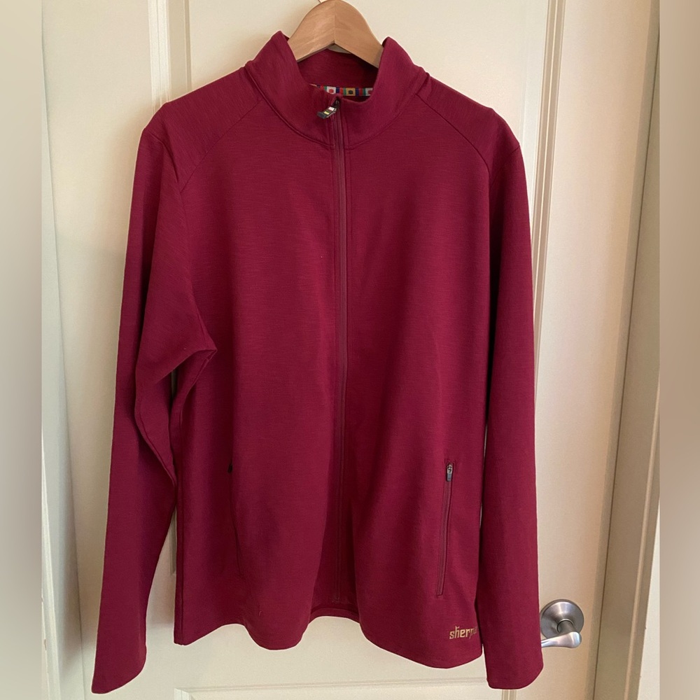 Sherpa outdoor gear XXL zip up top in dark red.